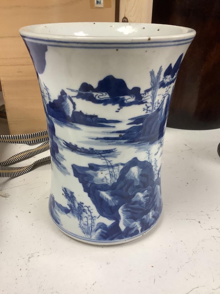 A Chinese blue and white porcelain brush pot, painted with a landscape, 17cm high, in later pine box
